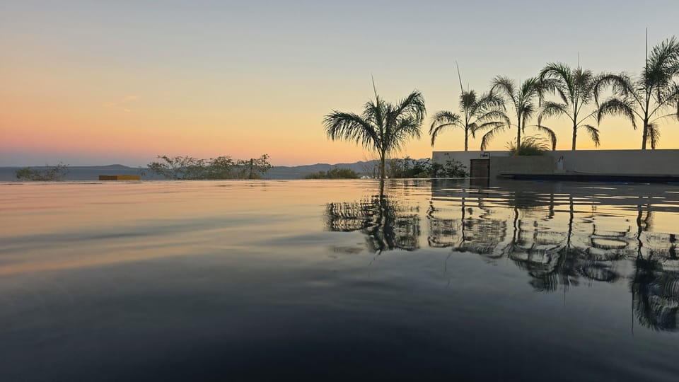 Heated Infinity Lap pool with jacuzzi
