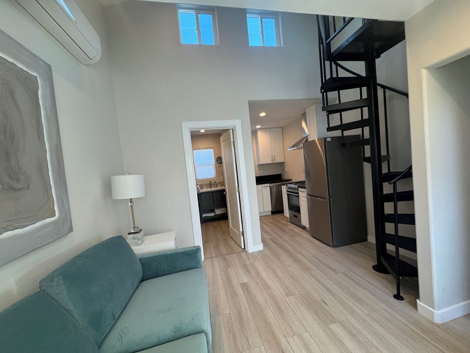 Abundant natural light from two skylights and two roofline windows.