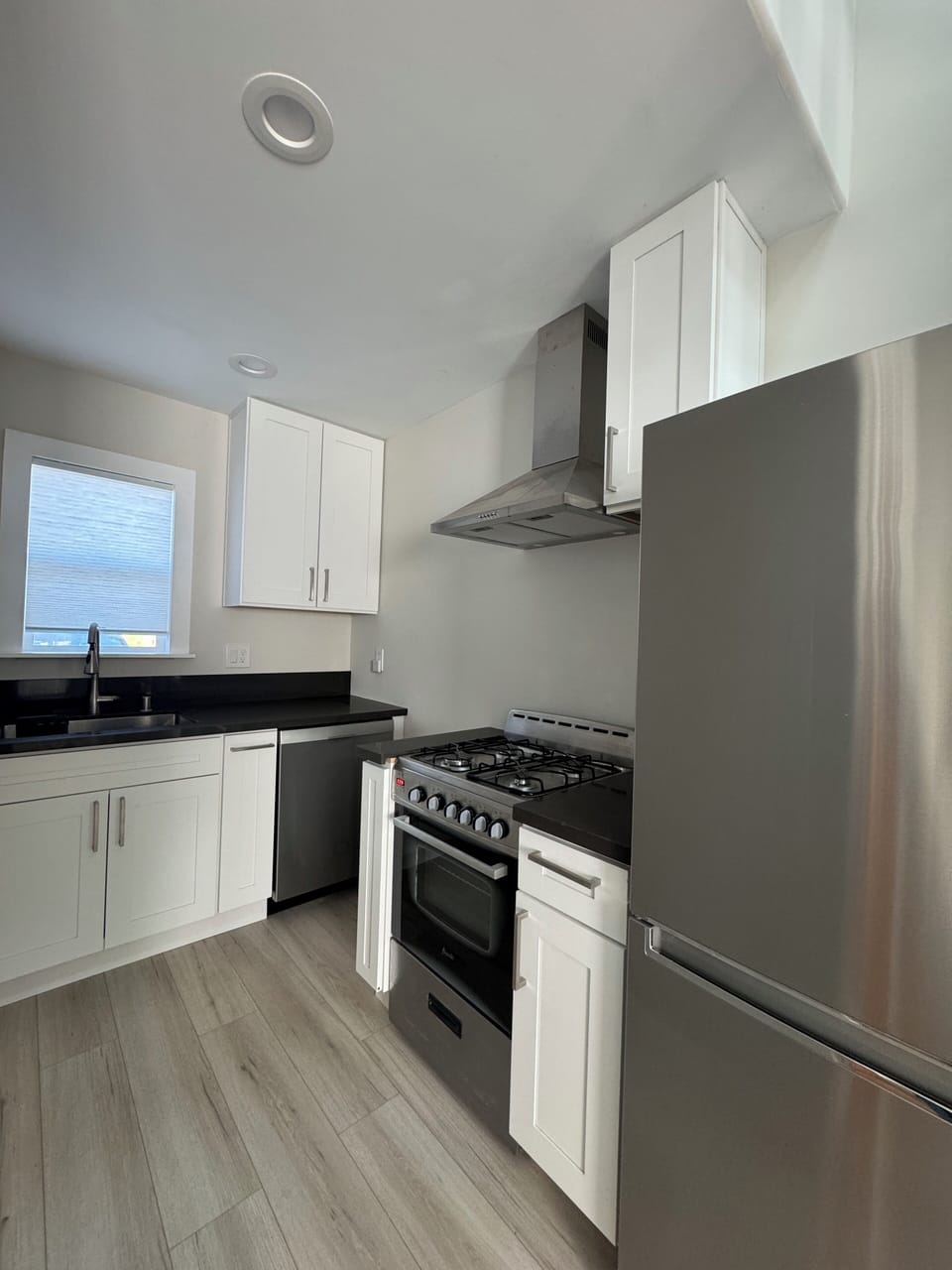 The kitchen - full amenities, including a dishwasher and disposal.