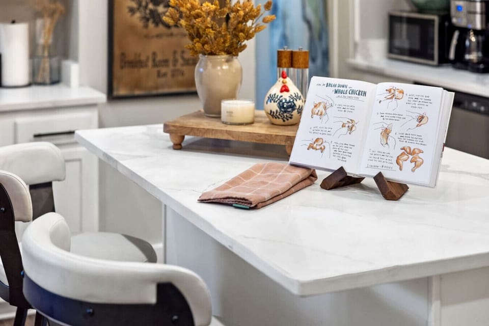 Set the Tone, Serve the Snacks – A welcoming island invites conversation while the prep space makes cooking a breeze.