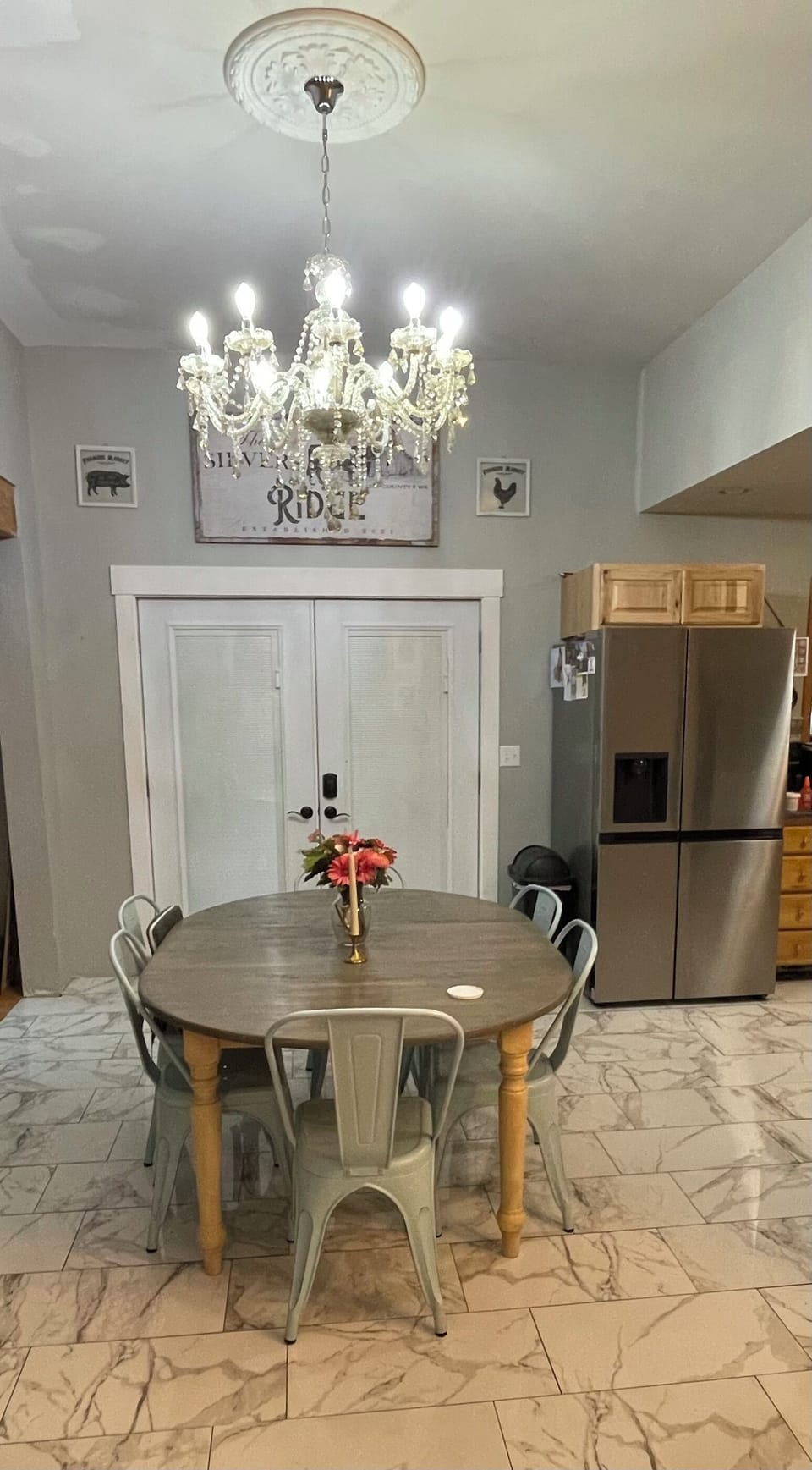 Dining room features expandable table, 6chairs with 2 extra chairs- first floor