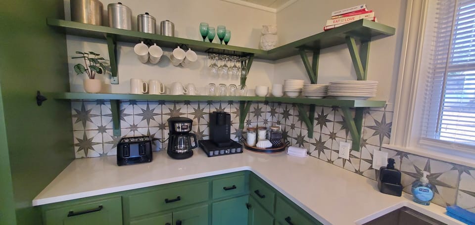 Coffee bar with coffee, creamer, and sugar provided 