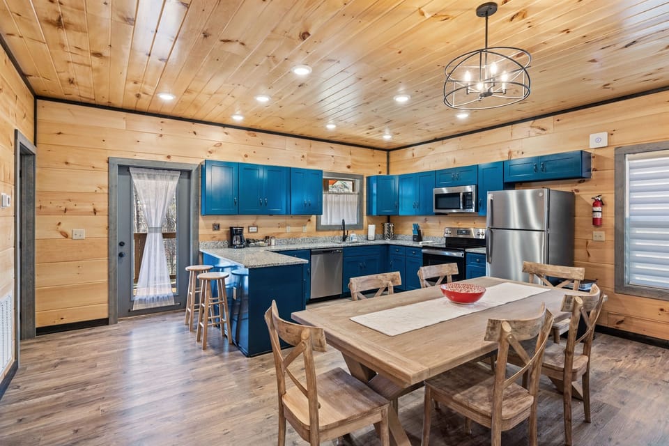 Feel like dining in?  Enjoy the dining/kitchen area that includes a table for 6 with additional barstool seating.