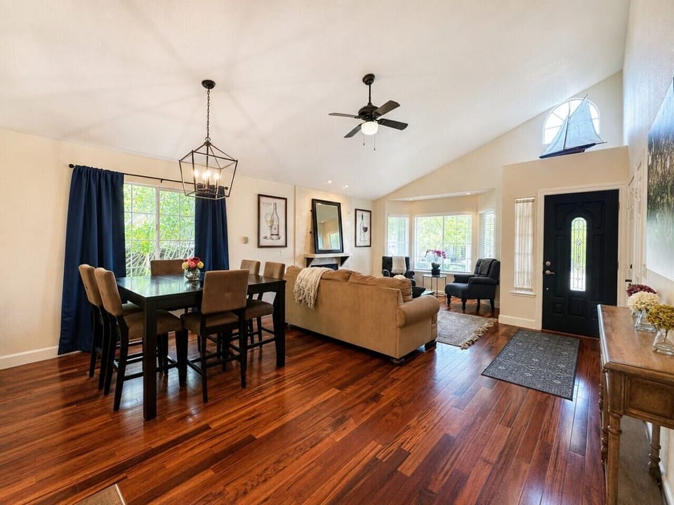 Second living room space with dining area and bay window