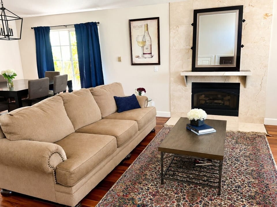 Second living room seating area with gas burning fireplace