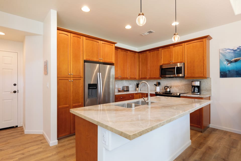 Spacious open concept kitchen, perfect for preparing delicious island inspired meals