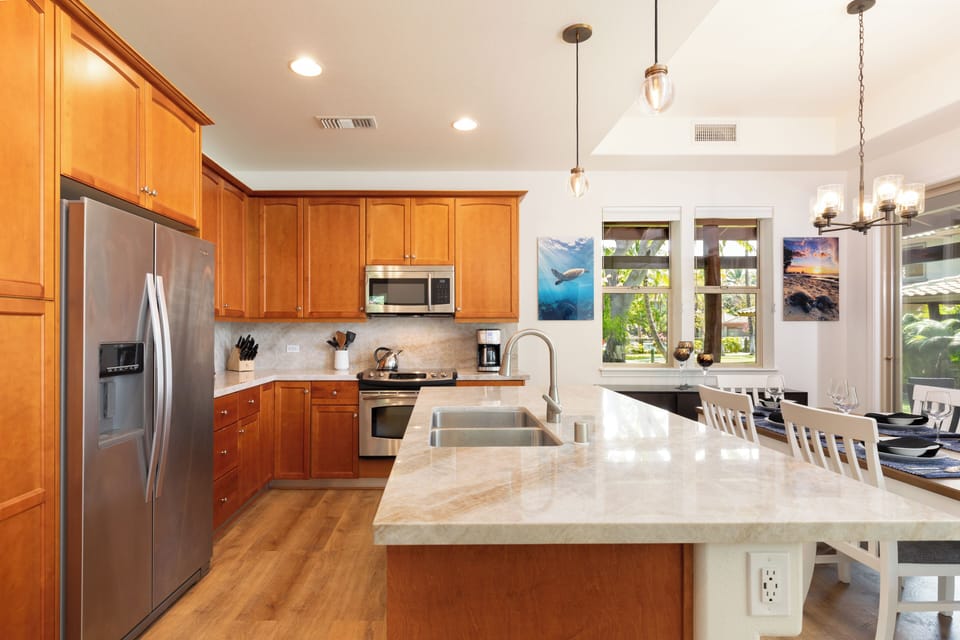 Spacious kitchen with a nice assortment of spices, oil and essentials provided