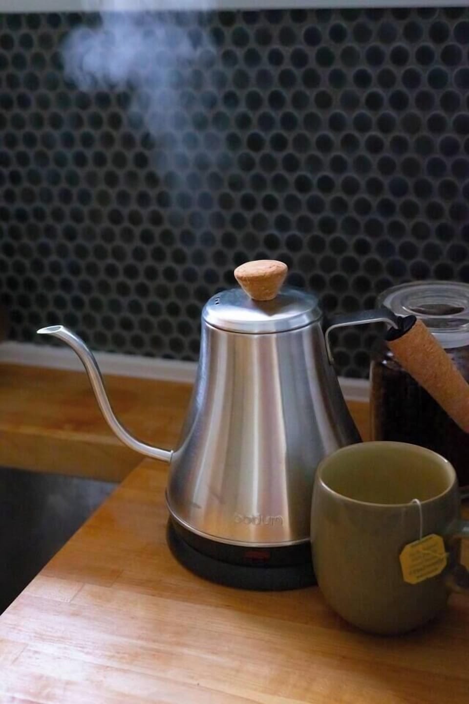 An electric hot water kettle and coffee and tea are provided.
