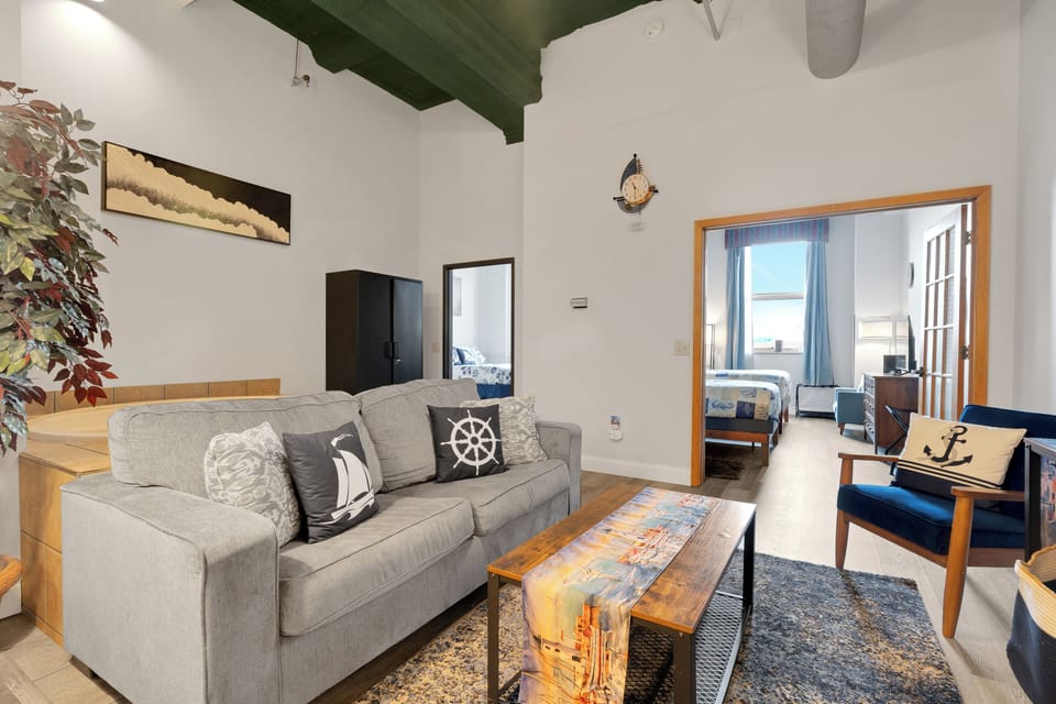 The living room sofa can turn into a nice queen size bed.