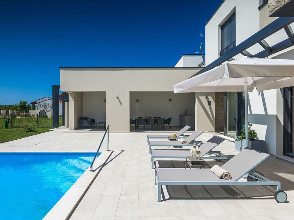 Swimming Pool, Composite Material, Outdoor Furniture, Estate, Concrete, Resort, Shade, Chair, Villa, Design