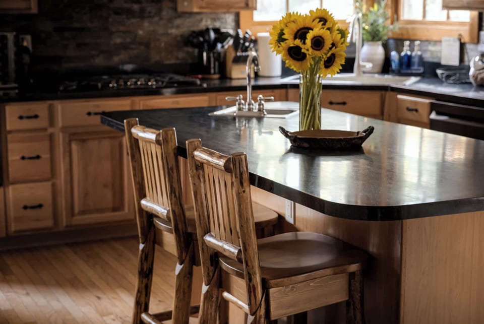 Island seating with a smooth countertop—perfect for coffee, quick bites, and catching up.