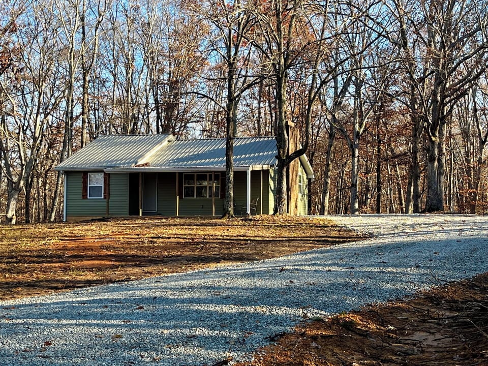 The cozy cabin on Bible Grove Rd.