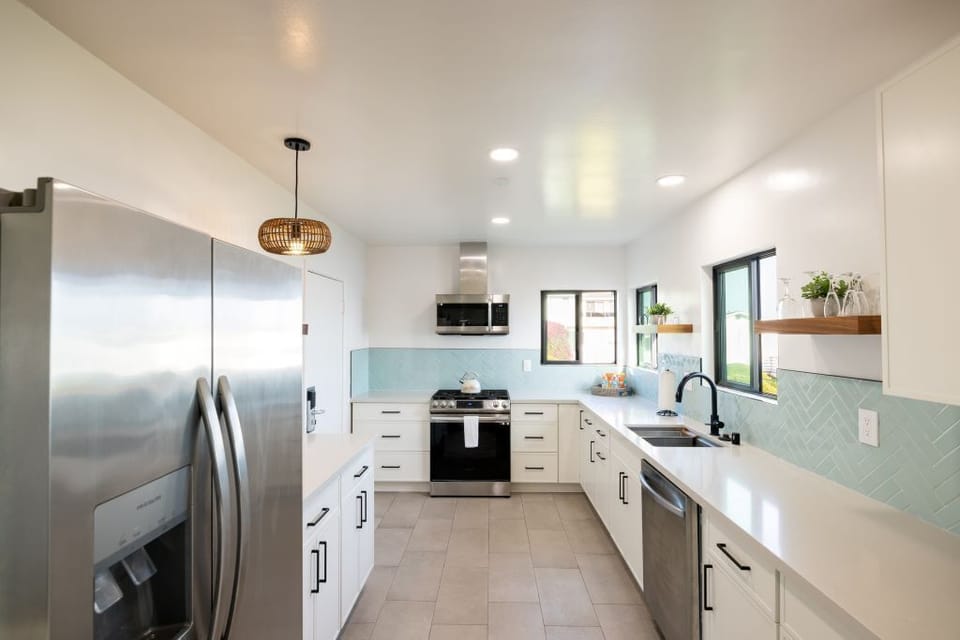 Kitchen equipped with full appliances and utensils for 8 people.