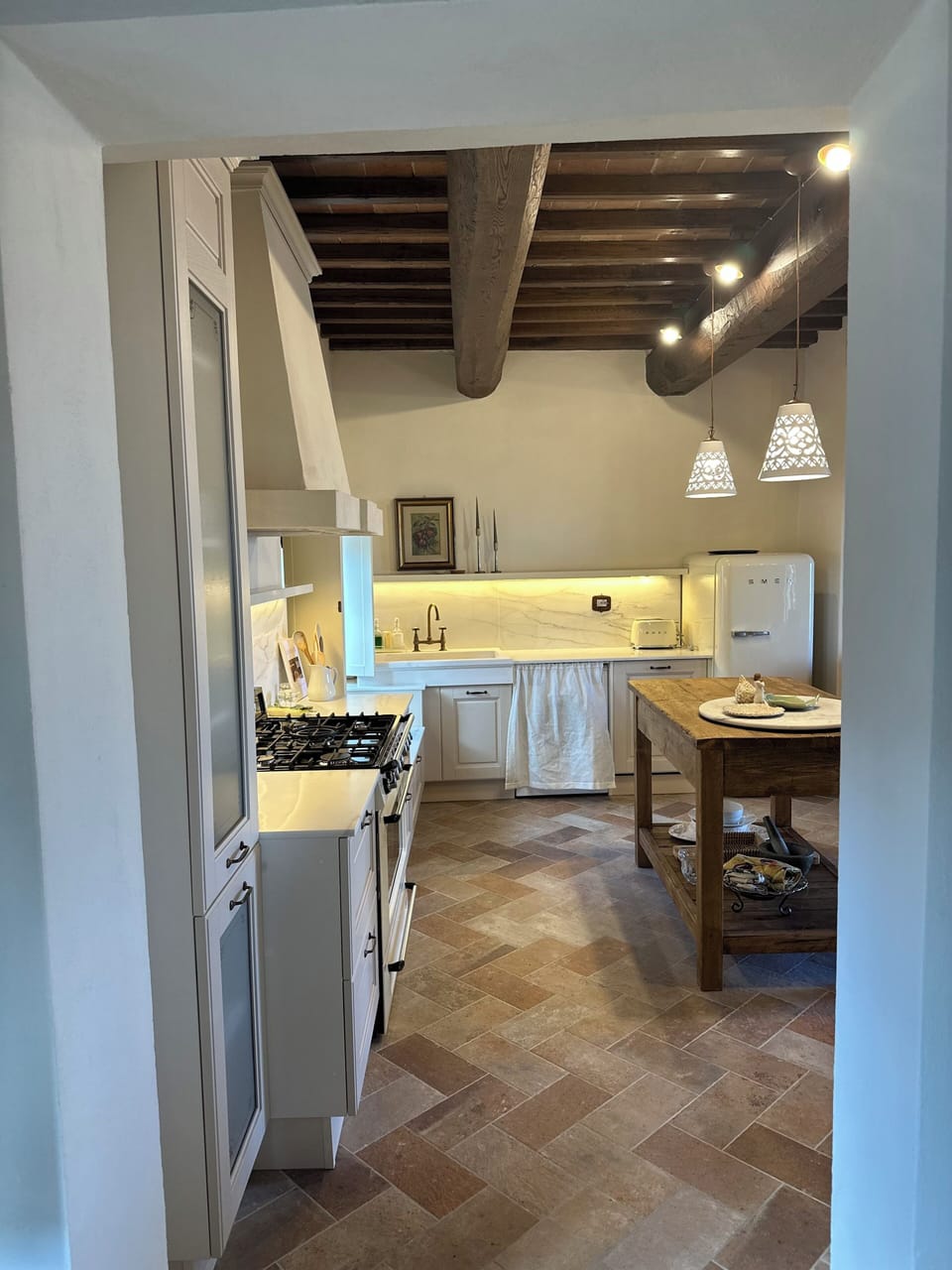 View into the Kitchen from the hallway to the bedroom.