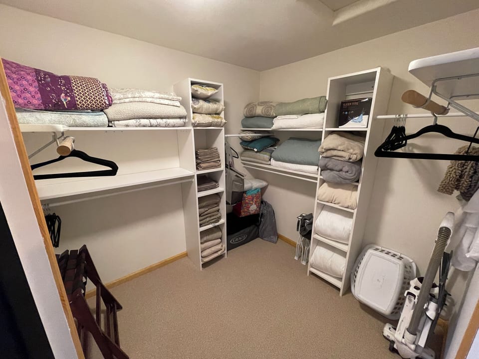 Master closet with extra linens