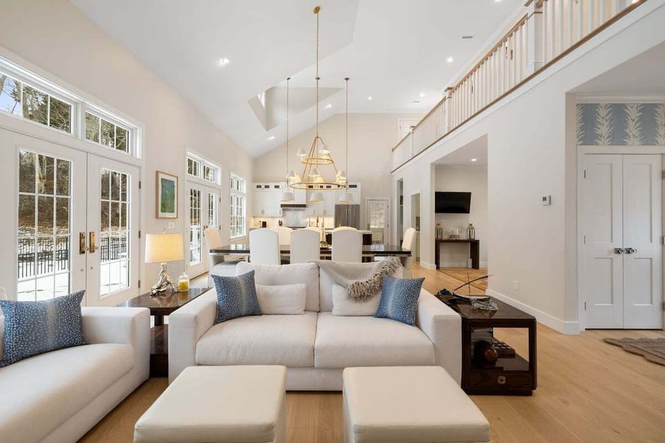 View of the living room into dining area and kitchen.