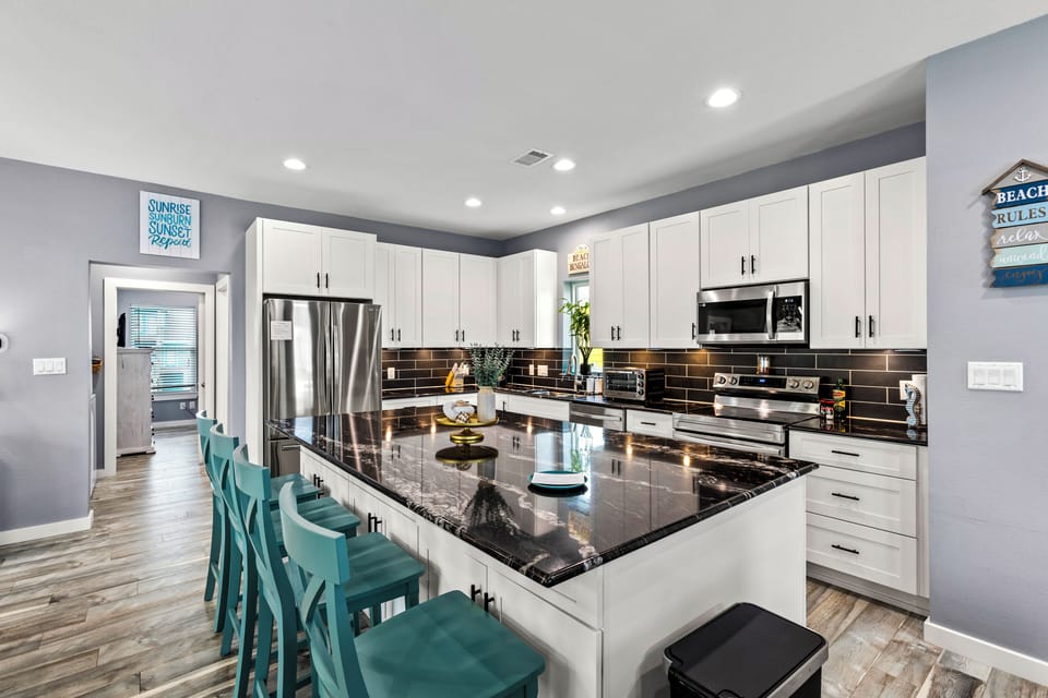 Cook with ease using stainless appliances, a Keurig, drip coffee maker, and all the essentials.