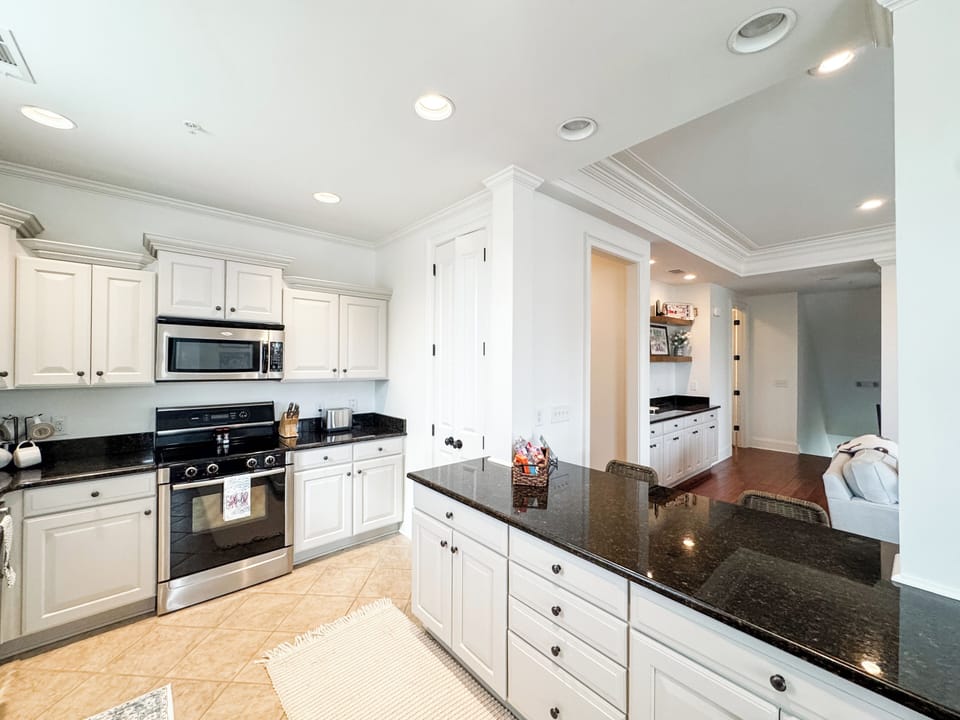 Stainless appliances and a fully stocked kitchen. Everything needed to cook. 