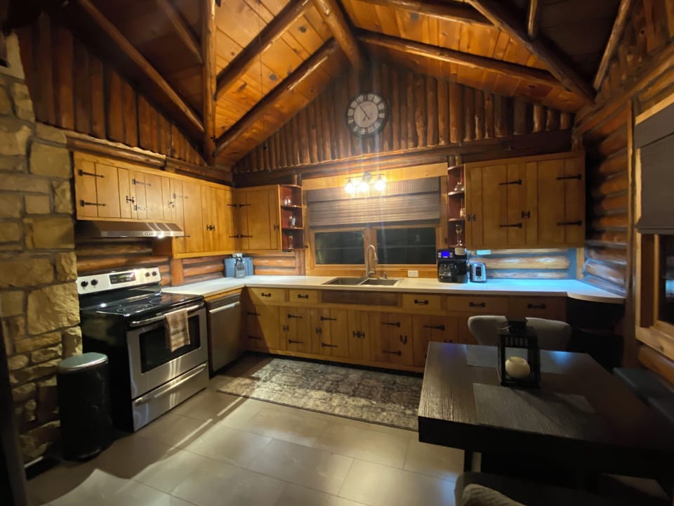 Fully stocked kitchen with microwave and plentiful coffee selections. 