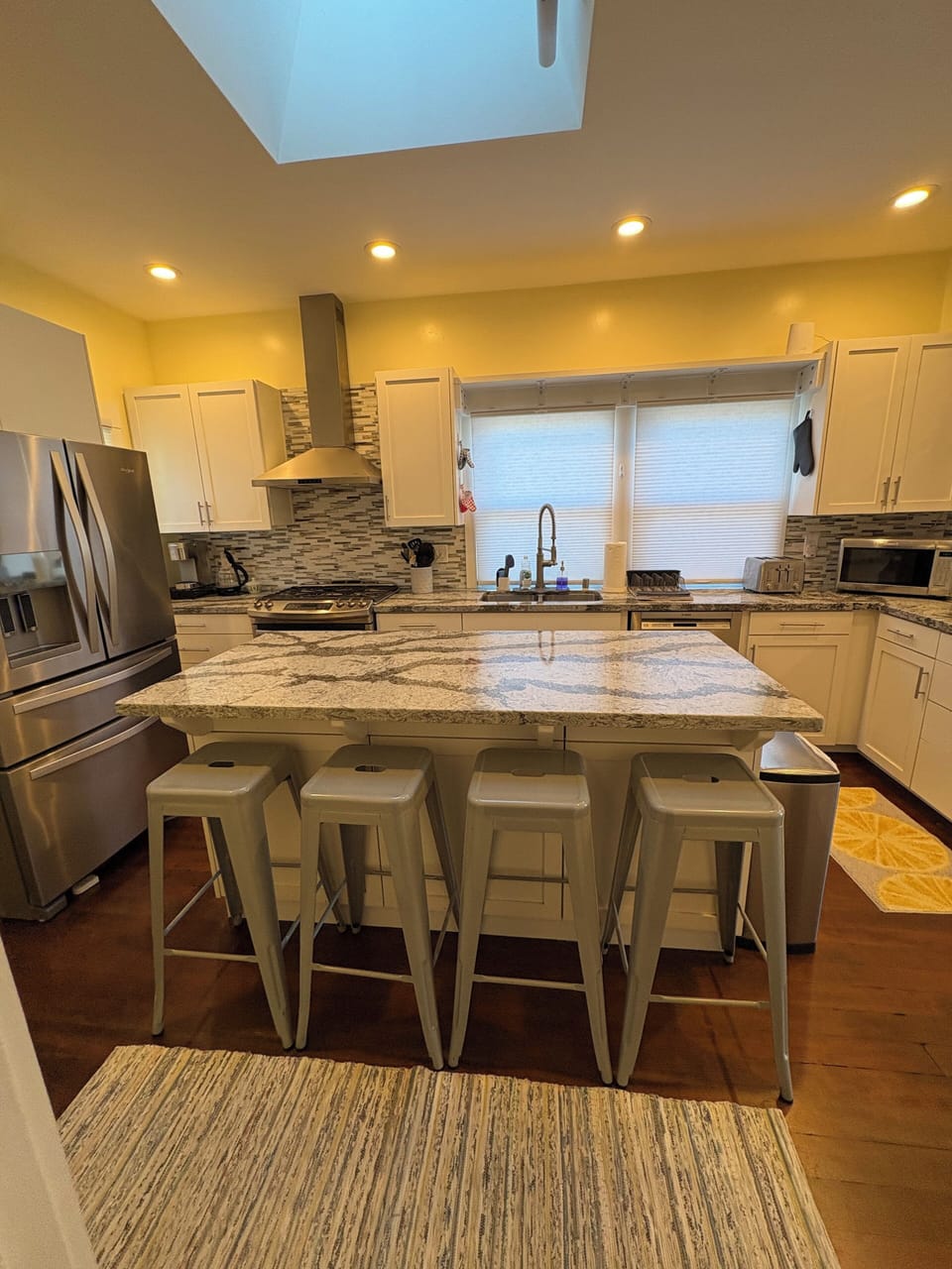 Kitchen with large island, skylight, and lots of counter space