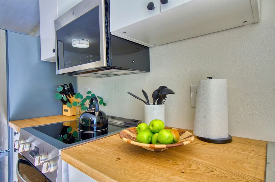 Prepare your favorite meals with ease in this kitchenette, complete with all the essentials for your stay.