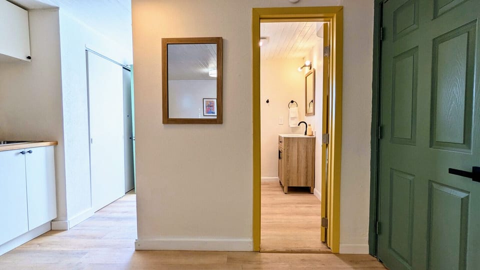 Light and airy bathroom with a sleek stand-up shower and modern finishes.