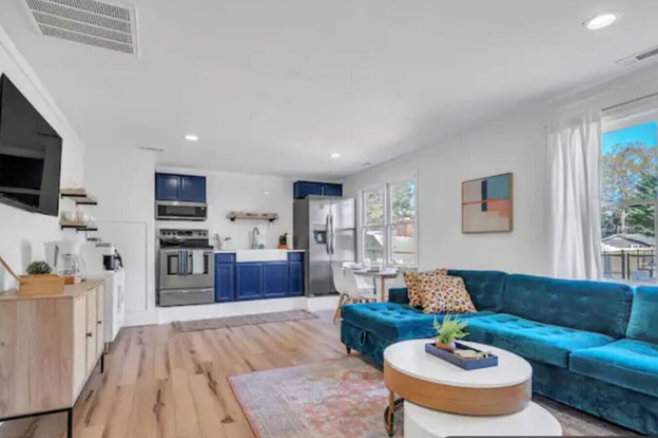 Enter into our open floor plan living and dining area with a fully stocked kitchen with new stainless steel appliances