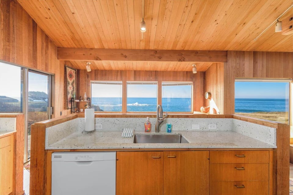 The breezy kitchen offers ample space & every home comfort