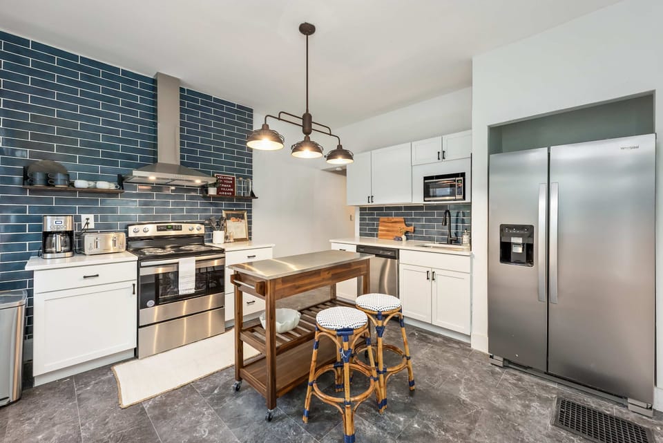 The updated kitchen offers ample space & all the comforts of home