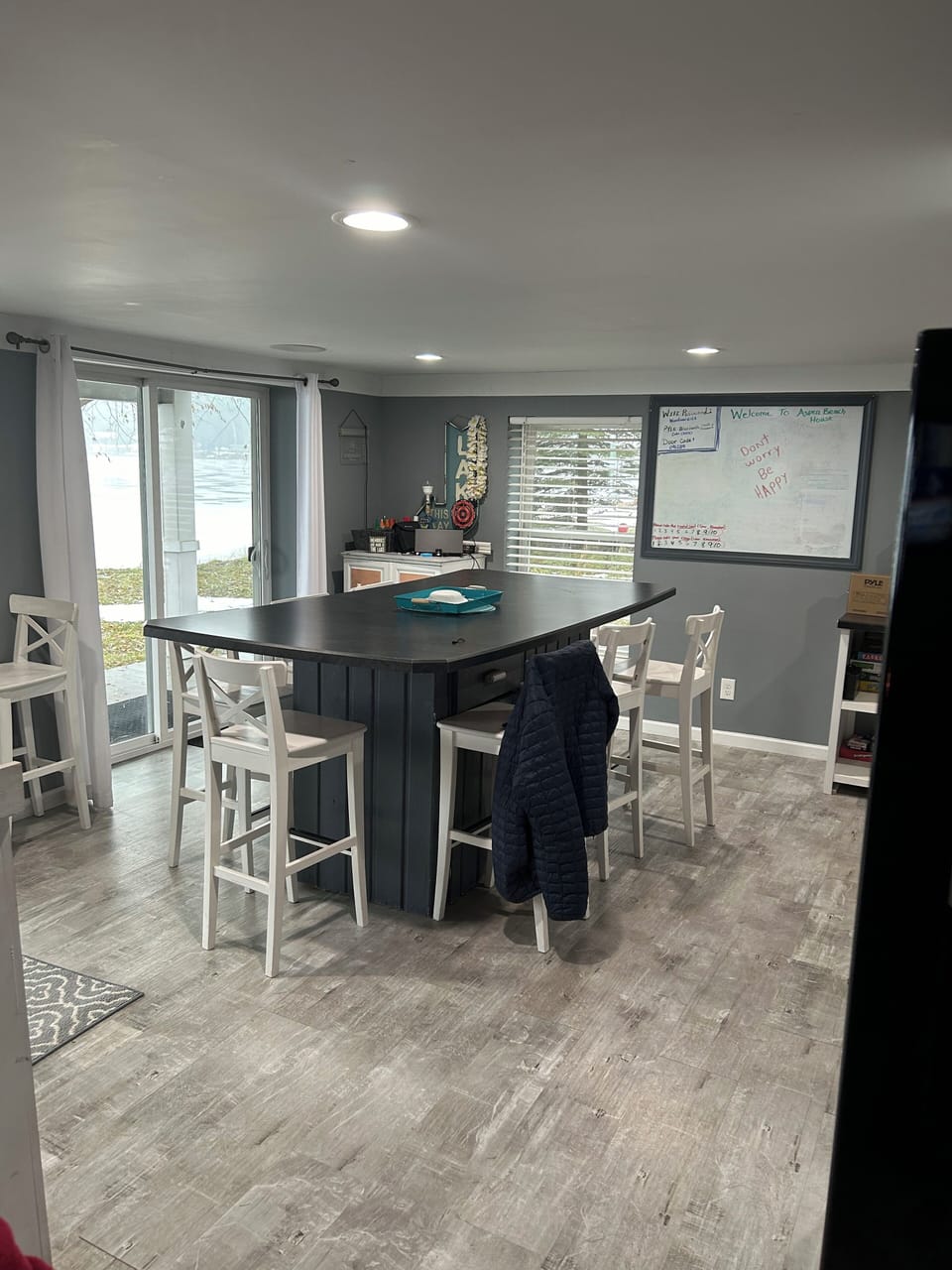 Dining area with seating for 8 and two sliders out to the lake!