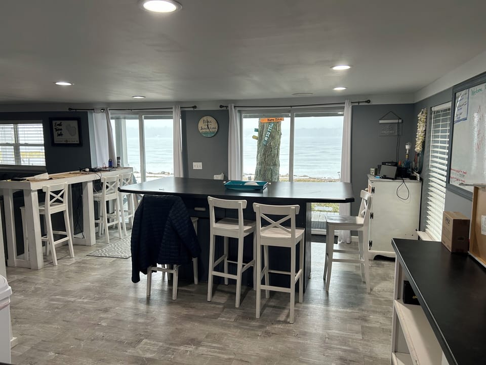 Table for 8, Counter with 4 more seats and 2 sliders out to deck and lake