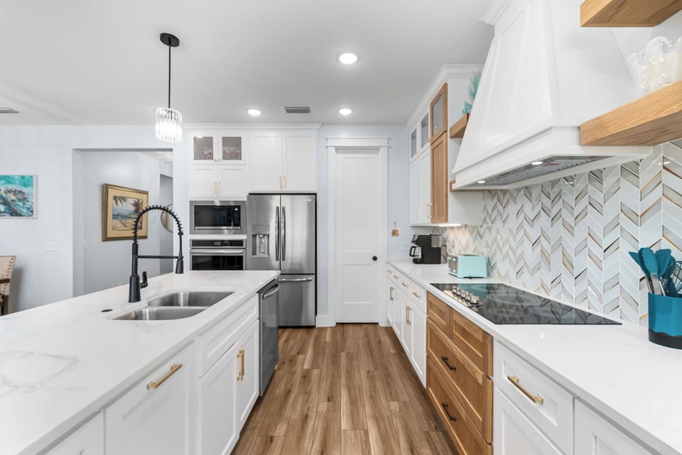 Custom kitchen, cooks or family members sitting in the living room. 