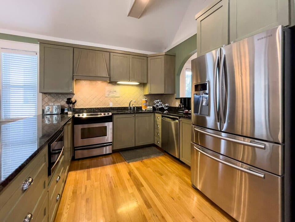 Fully equipped kitchen with stainless steel appliances and all the comforts of home
