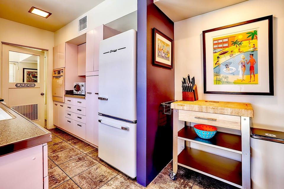 New fridge, dishwasher, electric stove and microwave in vintage style.  