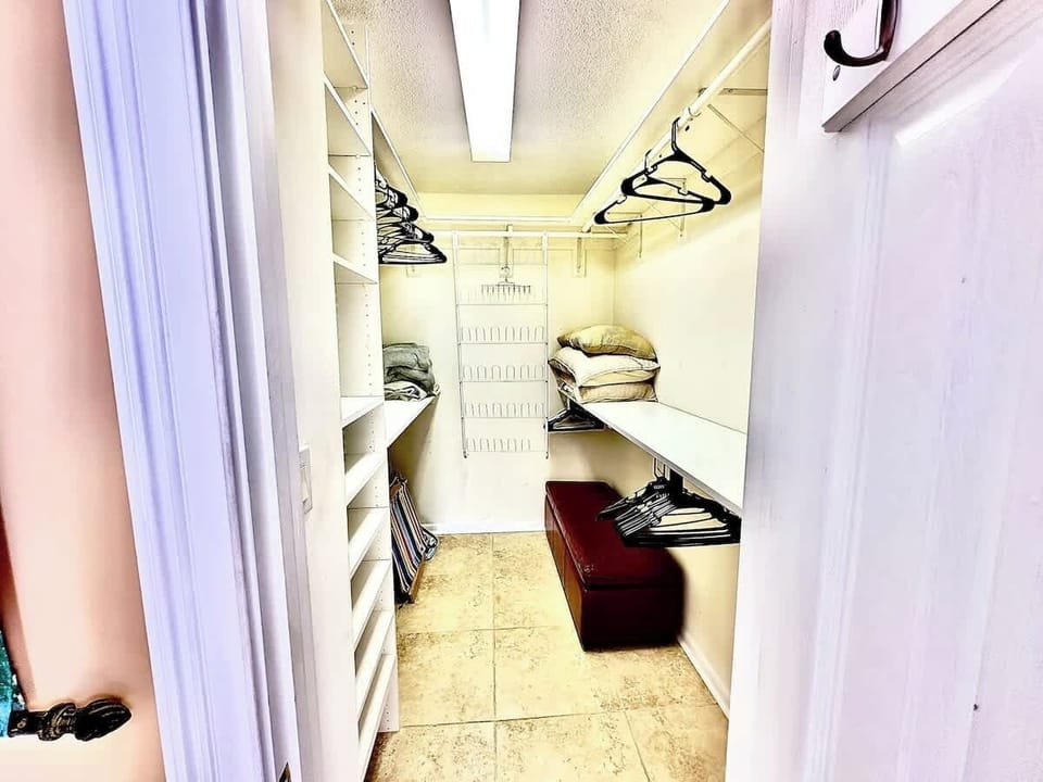 Walk-in closet! There are two beach chairs available that you may take to the beach that are stored in this closet (be sure to remove all sand from the chairs before returning them to the closet).
