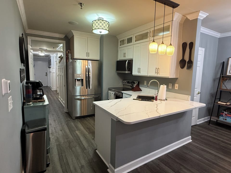Updated kitchen with brand new cabinets and new quartz counters
