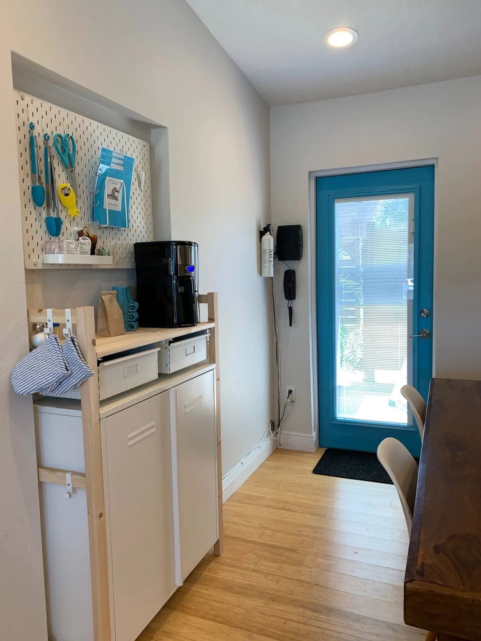 Kitchen comes complete with a BrewMaster 12-cup coffee maker, full cooking utensils and a farm-house style rustic dining table.