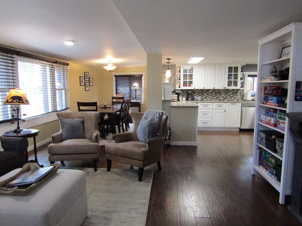 Open concept with the living room adjacent to the kitchen and dining area