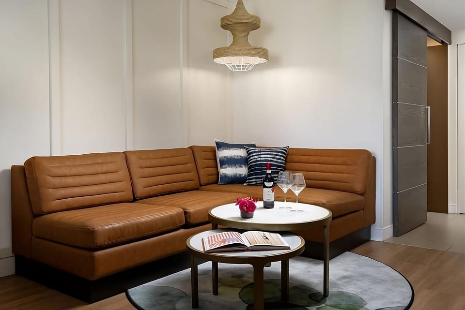 Unwind on the plush sectional with a nightcap nearby.