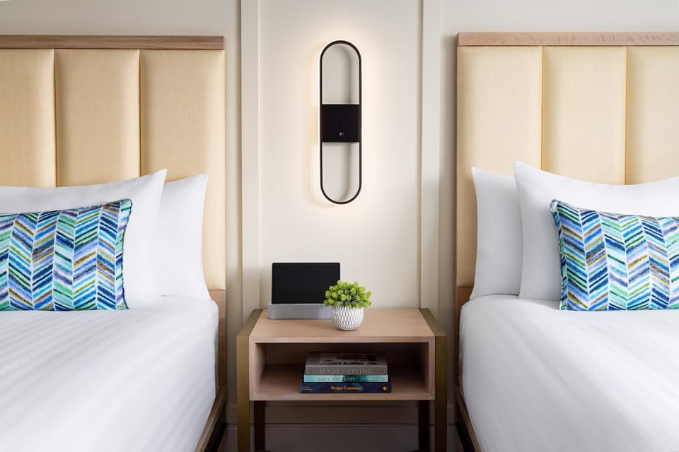 Admire boutique details and soft lighting between restful beds.