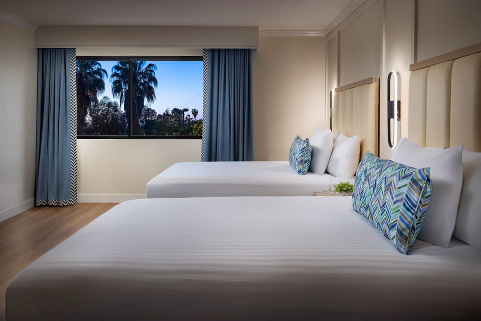 Wake refreshed to palm views and crisp, quiet comfort.