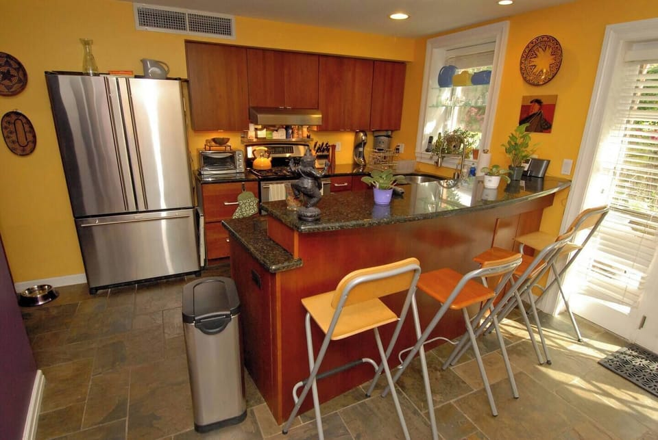 View into kitchen from dining area.