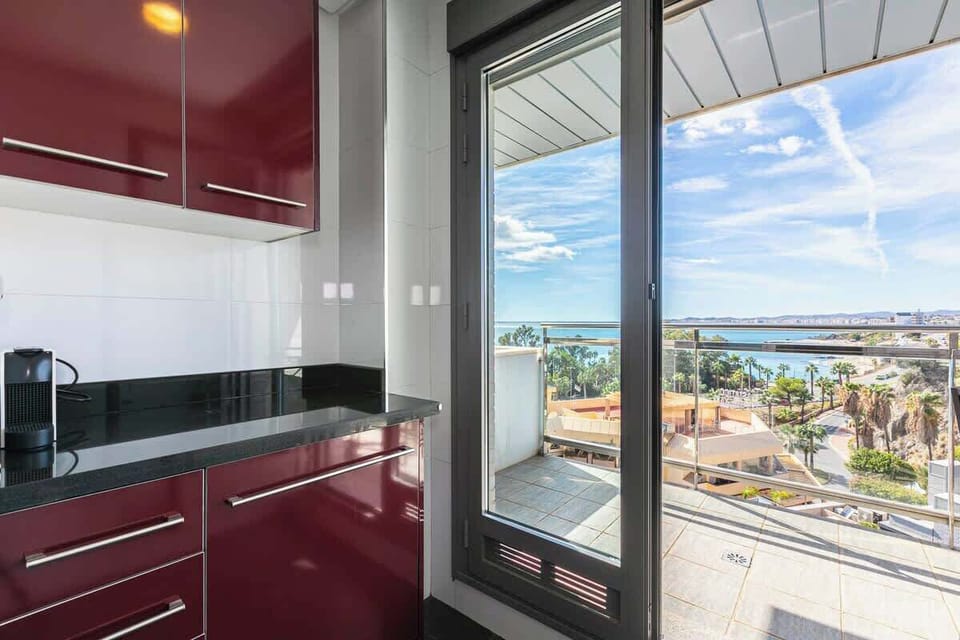 fully equipped kitchen with sea view