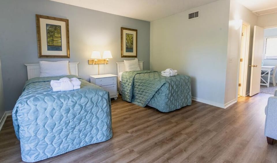 Settle in comfortably with crisp linens and calming tones.