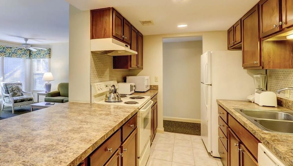 Cook with ease in the fully equipped, open kitchen.