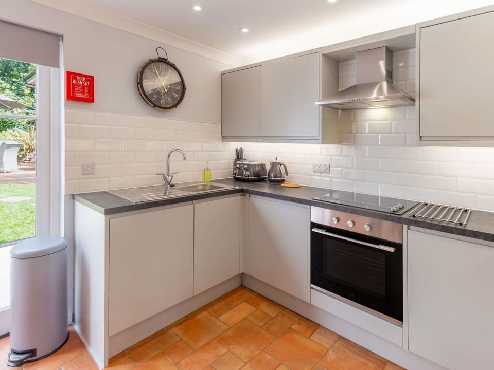 Kitchen, Kitchen Appliance, Countertop, Major Appliance, Cabinetry, Interior Design, Flooring, Home Appliance, Kitchen Stove, Wood