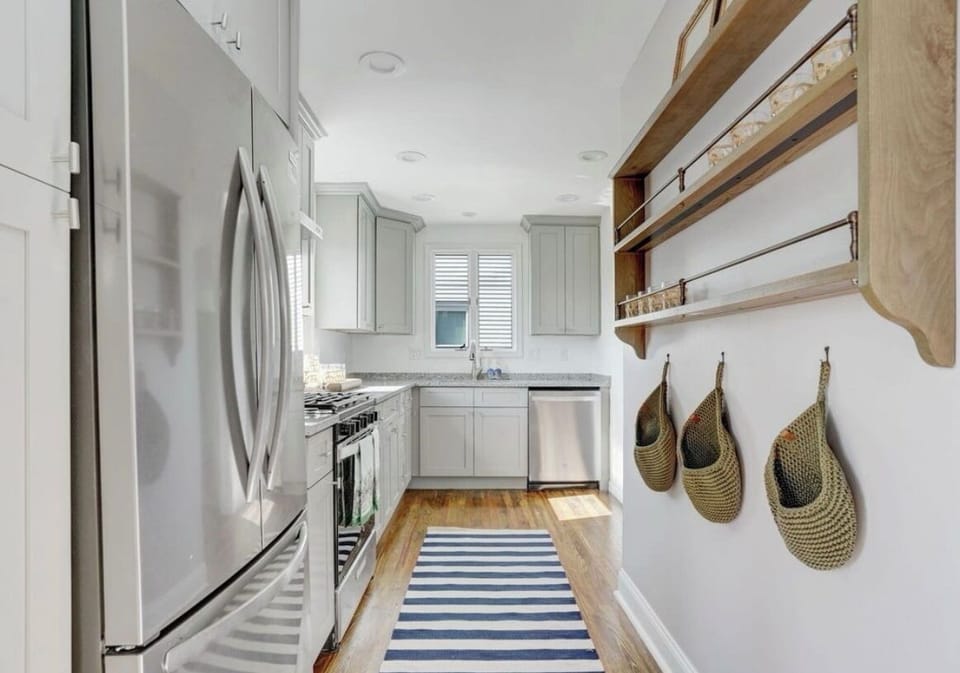 Fully stocked kitchen with stainless steel appliances