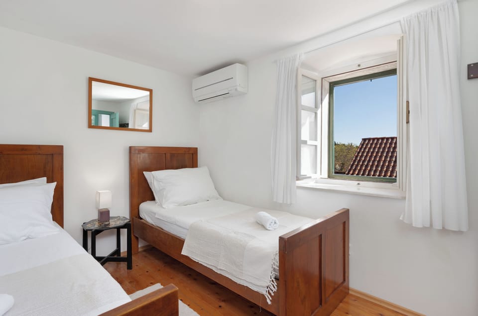 The twin bedroom overlooking the courtyard