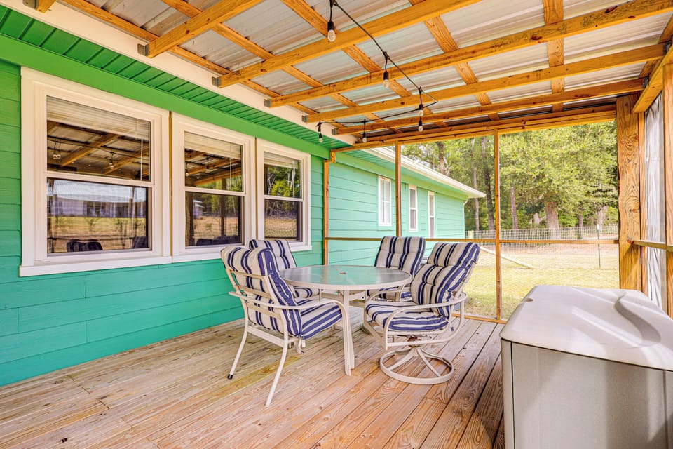 Property Exterior | Single-Story Home | Large Yard | Screened Porch