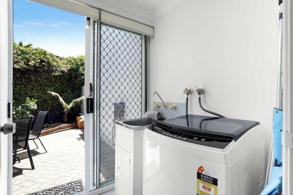Laundry facility: washing machine only and clothes airer .Clothes line also available in back yard.